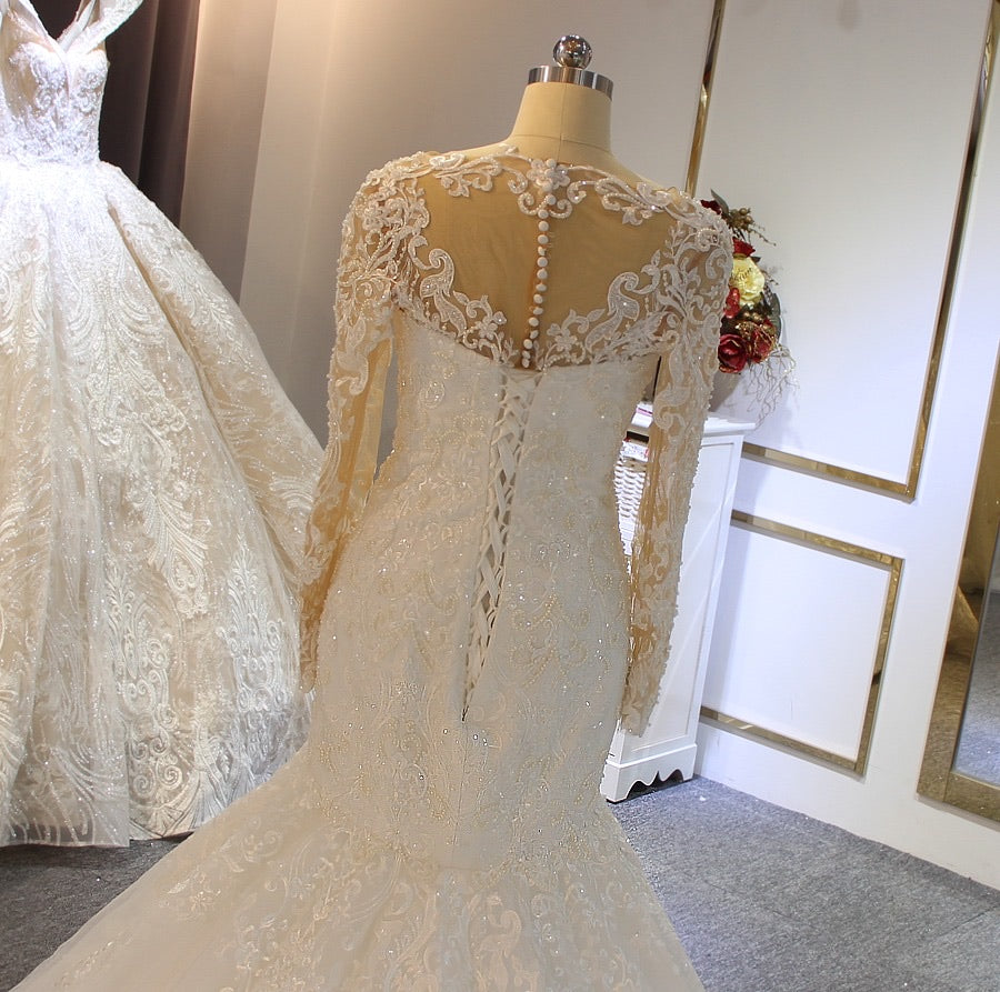 Mermaid wedding gown store with long train